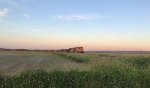 E/B BNSF 7126/7712 heading for the Mud Bay crossing at sunset....Mt. Baker in the background.